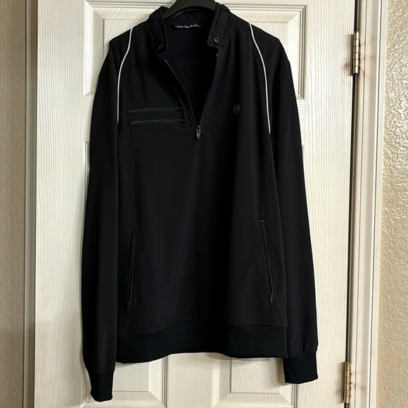Black 3/4 zip men’s light weight Travis Matthew jacket